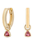 Gold hoop earrings with pink gemstones on a white background