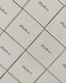  'Hilary Alexandria' branded jewelry boxes arranged in a diamond pattern.